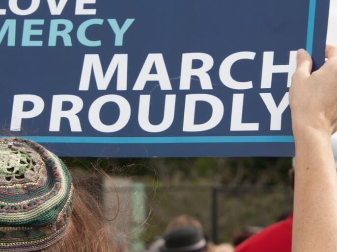 Jewish man marching in protest