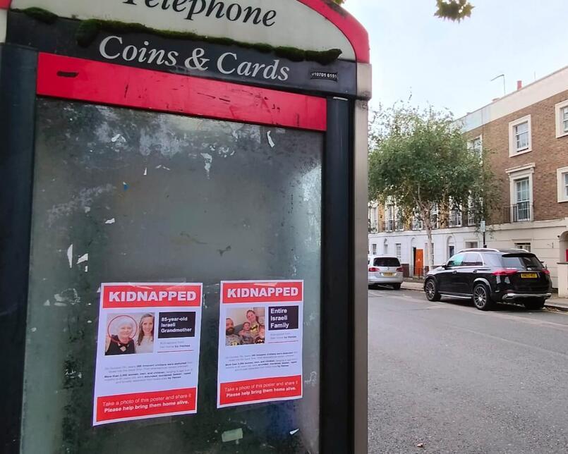Posters of Israeli kidnapped citizens hang London