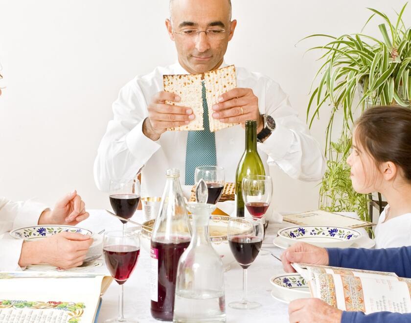 Jewish family celebrating Passover Seder
