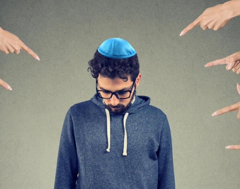 A Jewish man being blamed