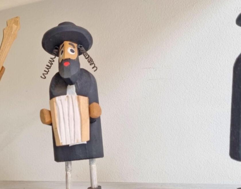 Jewish wooden figurines in a shop in Krakow, Poland