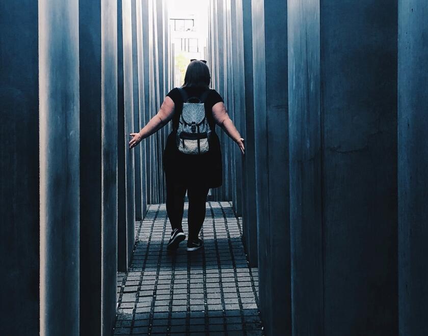 Girl at the Holocaust Memorial in Berlin