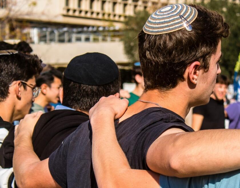 Young Jewish people standing together